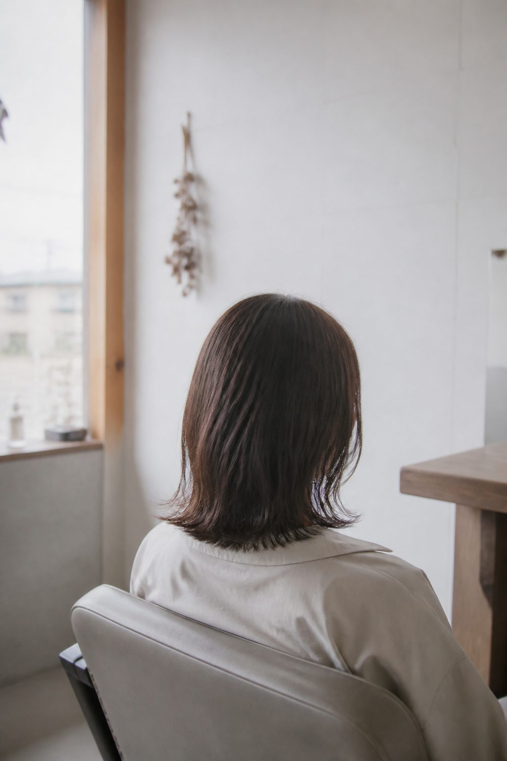 肩につく長さのボブ。うしろ姿（掲載イメージ）